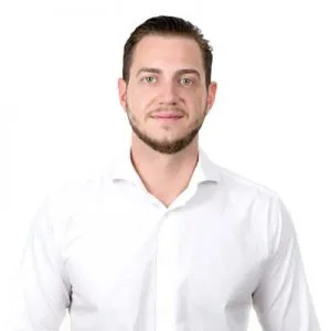 Porträt von René Renk im weißen Hemd, Mitherausgeber von ClickCopy