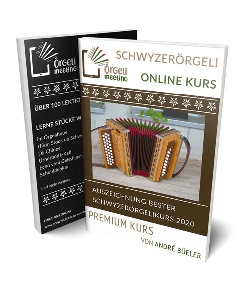 Kursbuch Schwyzerörgeli Online Kurs von André Büeler mit einem Schwyzerörgeli auf dem Cover